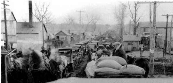 Autos in mud at Seminole, Oklahoma, circa mid-1920s.