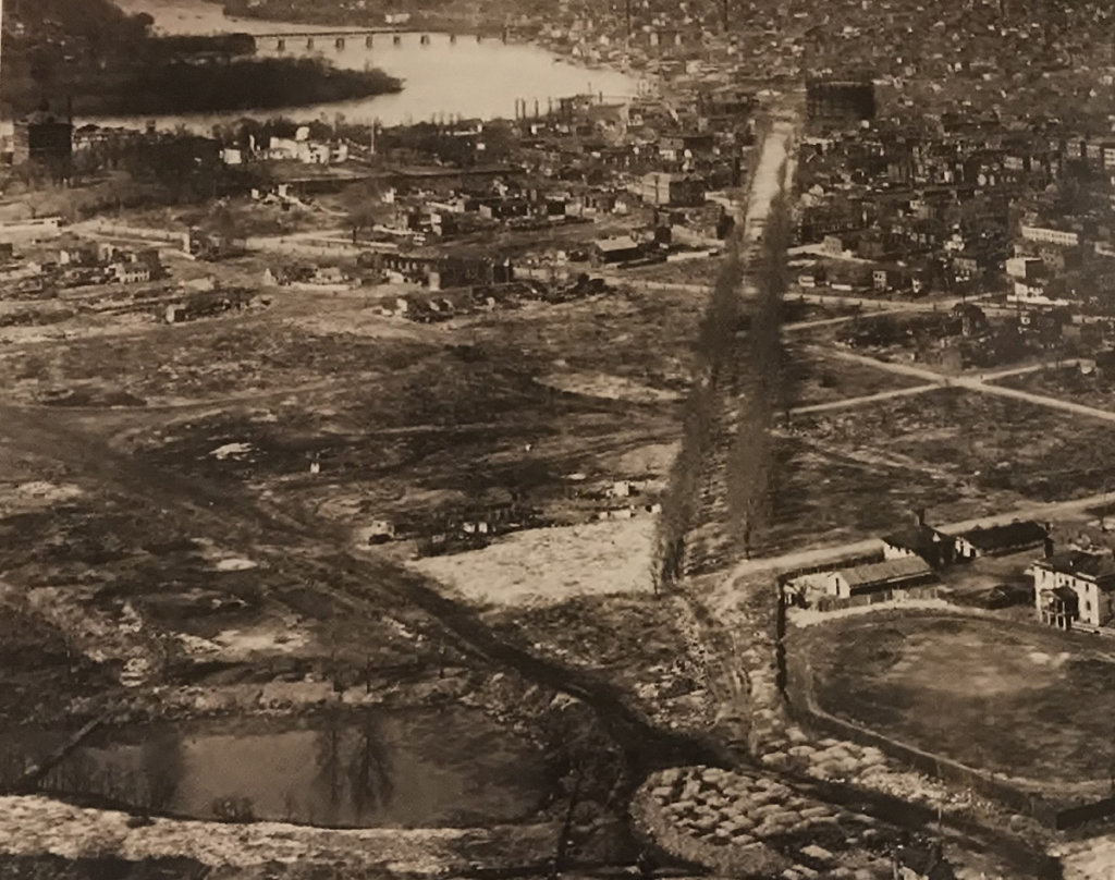 An early view from the Washington Monument showing the Washington Gas Light's West Station Gas Works at Foggy Bottom. 